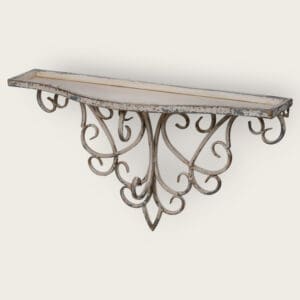 Stylish wall-mounted shelf with decorative iron accents and a distressed cream finish